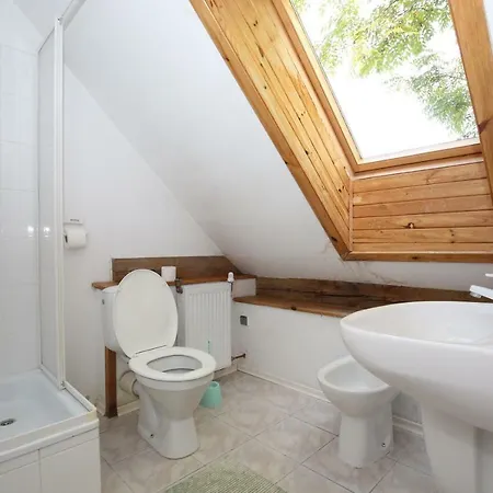 Mazurski Dworek Przy Jeziorze Quarto em Acomodações Particulares Dworackie